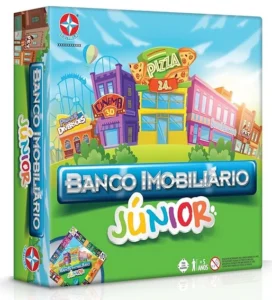 Jogo de Tabuleiro "Banco Imobiliário Junior" da marca Estrela. Contém a imagem de um banco colorido e o jogo consiste na compra e venda de imóveis, destinado à crianças.