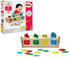 Jogo de tabuleiro infantil didático que consiste em encaixar peças coloridas com o formato de estrela, quadrado, retângulo e círculo. Brinquedo da Turma da Mônica.