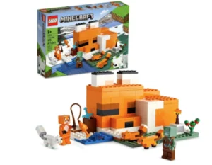 Imagem de um conjunto LEGO inspirado no jogo Minecraft. O destaque é uma casa construída no formato de uma raposa laranja e branca. O cenário inclui figuras de personagens e animais do jogo: um personagem com armadura, uma raposa, uma raposa bebê, um zumbi afogado e uma raposa branca do ártico. Ao fundo, a caixa exibe o ambiente do jogo com o mesmo conjunto montado. Indicado para maiores de 8 anos e contém 193 peças.