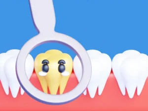 figura colorida de muitos dentes e um provavelmente com carie